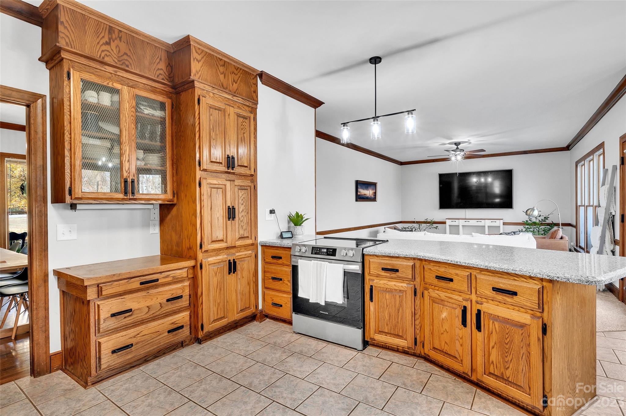700 West Zion Church Road Shelby, NC 28150 - Photo 15 of 45 a large kitchen with stainless steel appliances a stove and a refrigerator