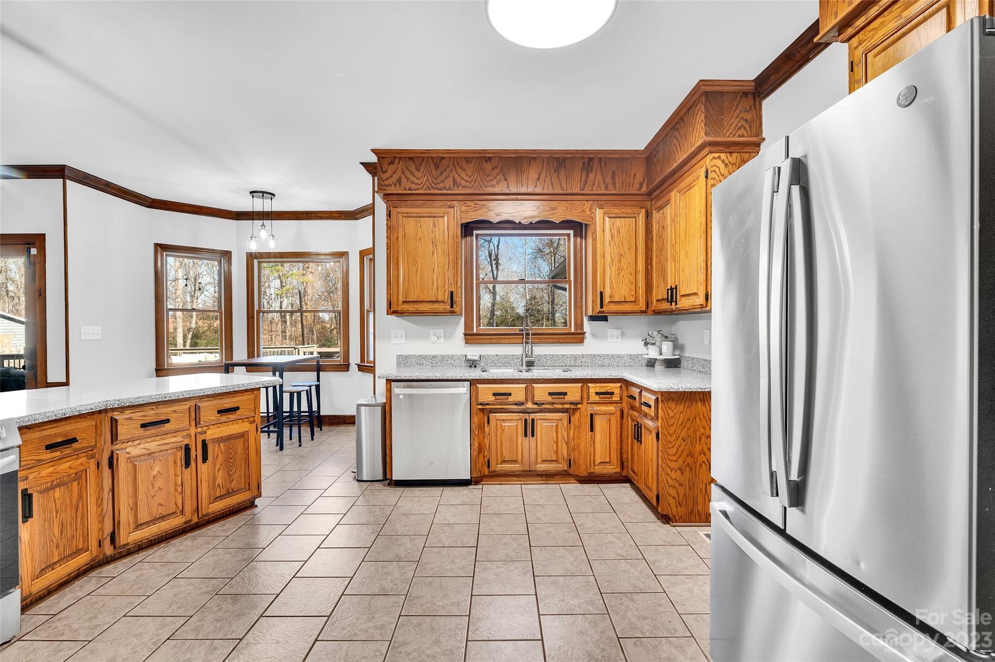 700 West Zion Church Road Shelby, NC 28150 - Photo 16 of 45 a kitchen with stainless steel appliances granite countertop a refrigerator and a stove top oven