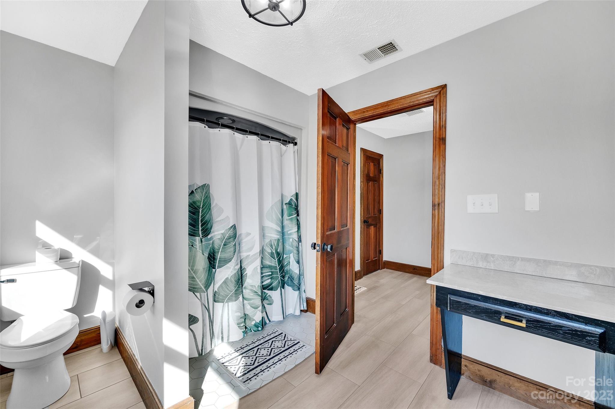 700 West Zion Church Road Shelby, NC 28150 - Photo 32 of 45 a spacious bathroom with a shower and a toilet