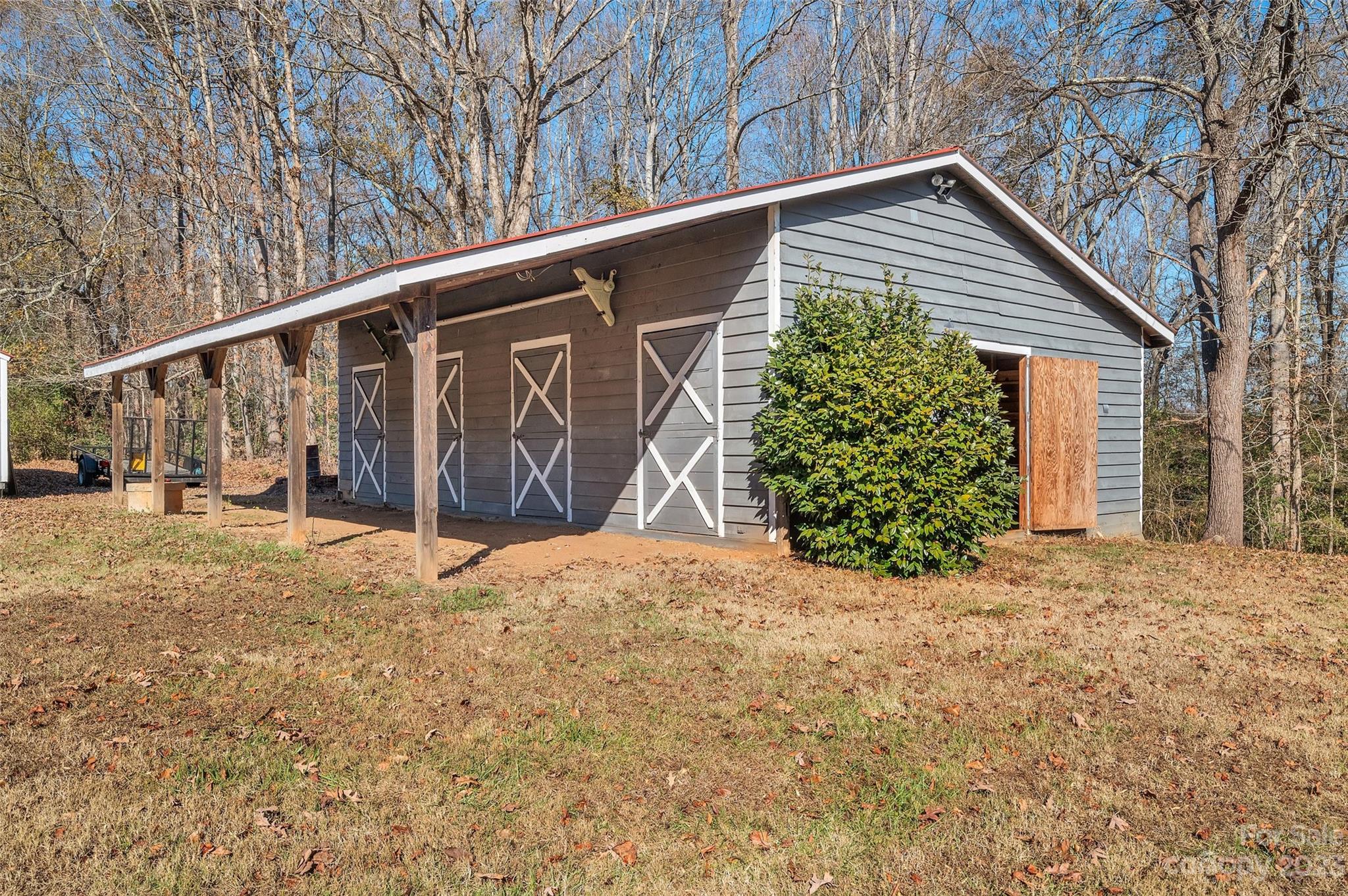700 West Zion Church Road Shelby, NC 28150 - Photo 37 of 45 a backyard of a house with lots of green space