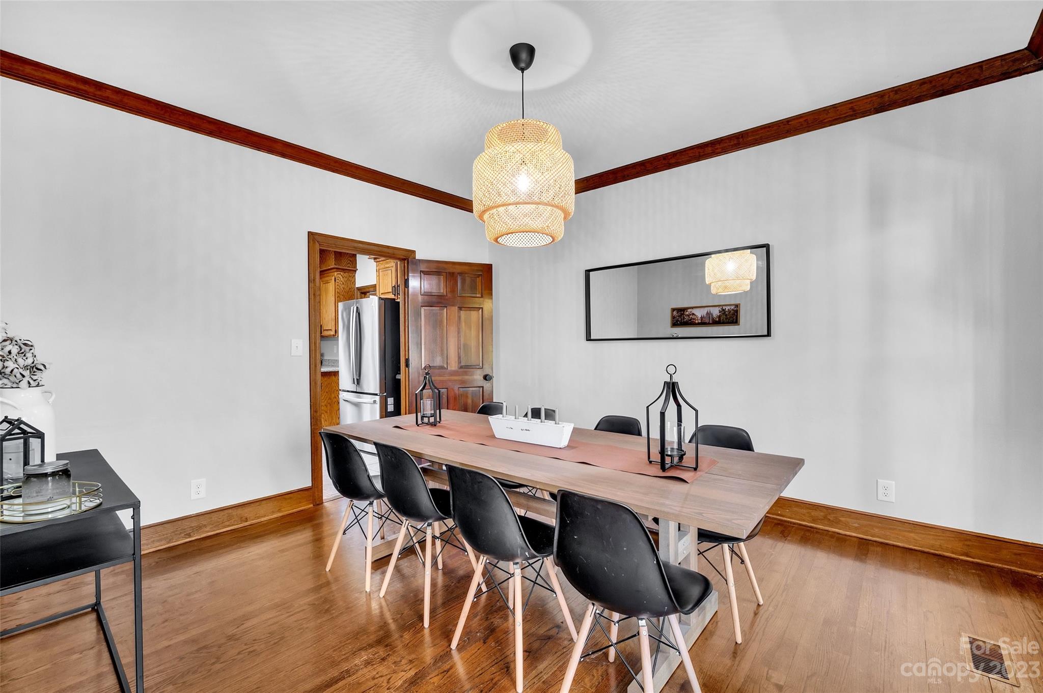 700 West Zion Church Road Shelby, NC 28150 - Photo 8 of 45 a view of a dining room with furniture and wooden floor