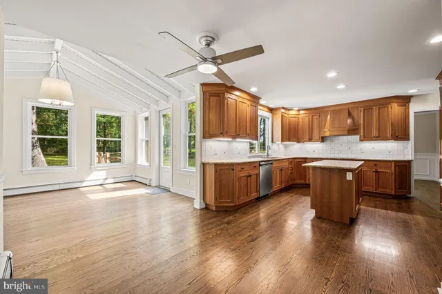 front view of a brick house with a large windows