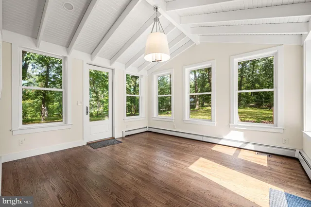 a kitchen with stainless steel appliances granite countertop wooden cabinets a sink and dishwasher