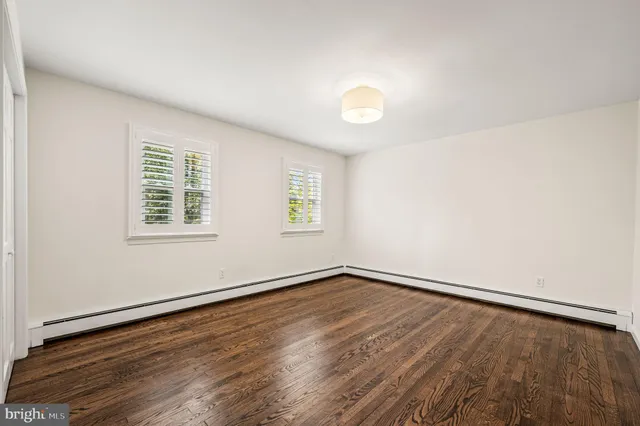 a view of entryway with wooden floor