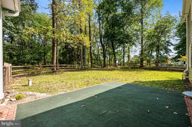 a view of a house with a big yard