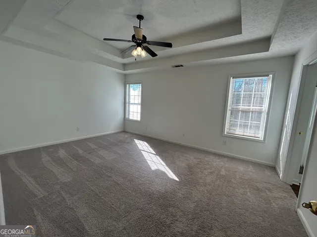 a bathroom with a bathtub and a sink