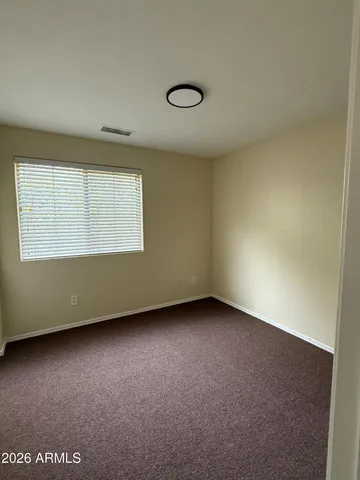 a utility room with a washer dryer and a counter top