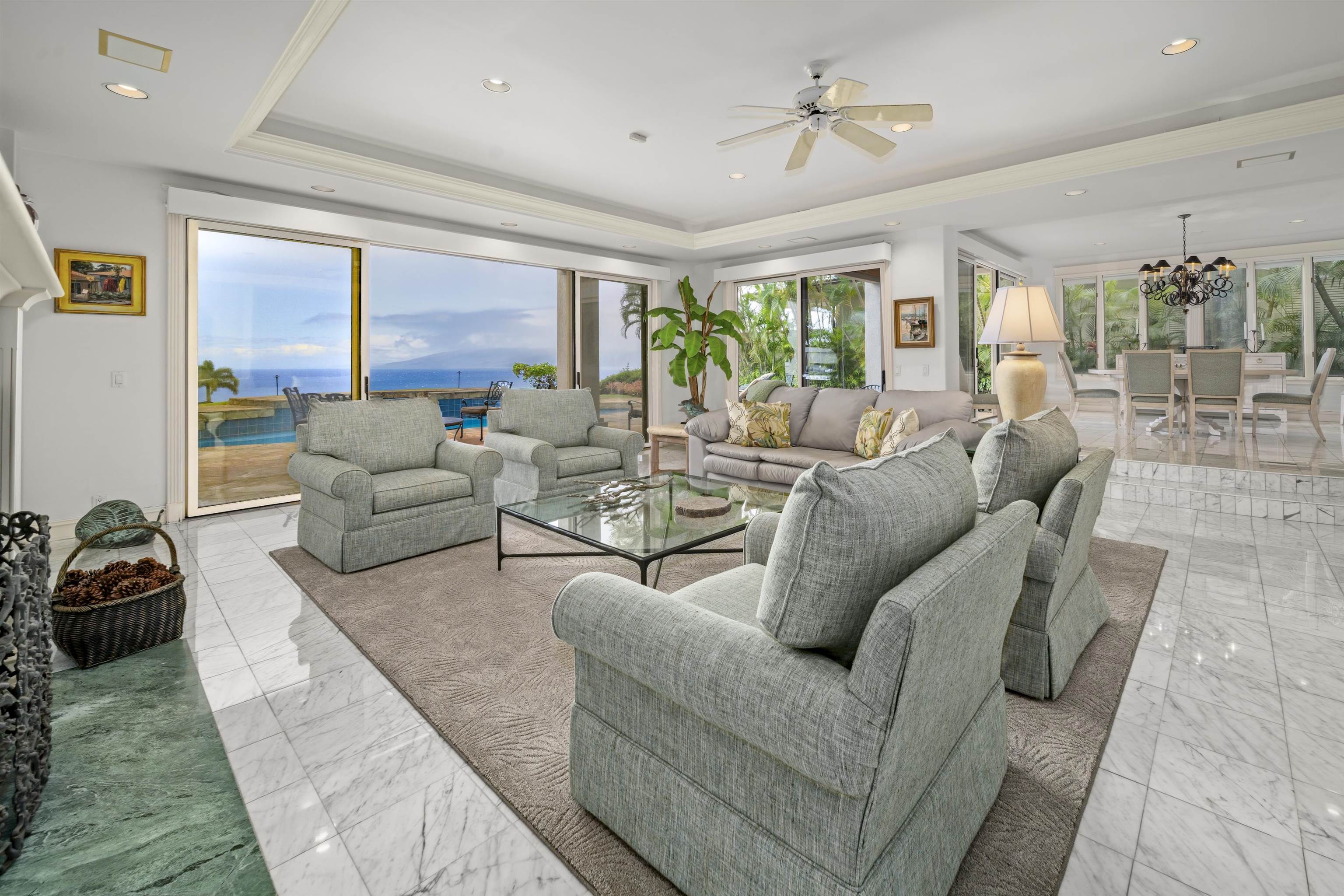 212 Crestview Road Lahaina, HI 96761 - Photo 14 of 50 a living room with furniture and a large window