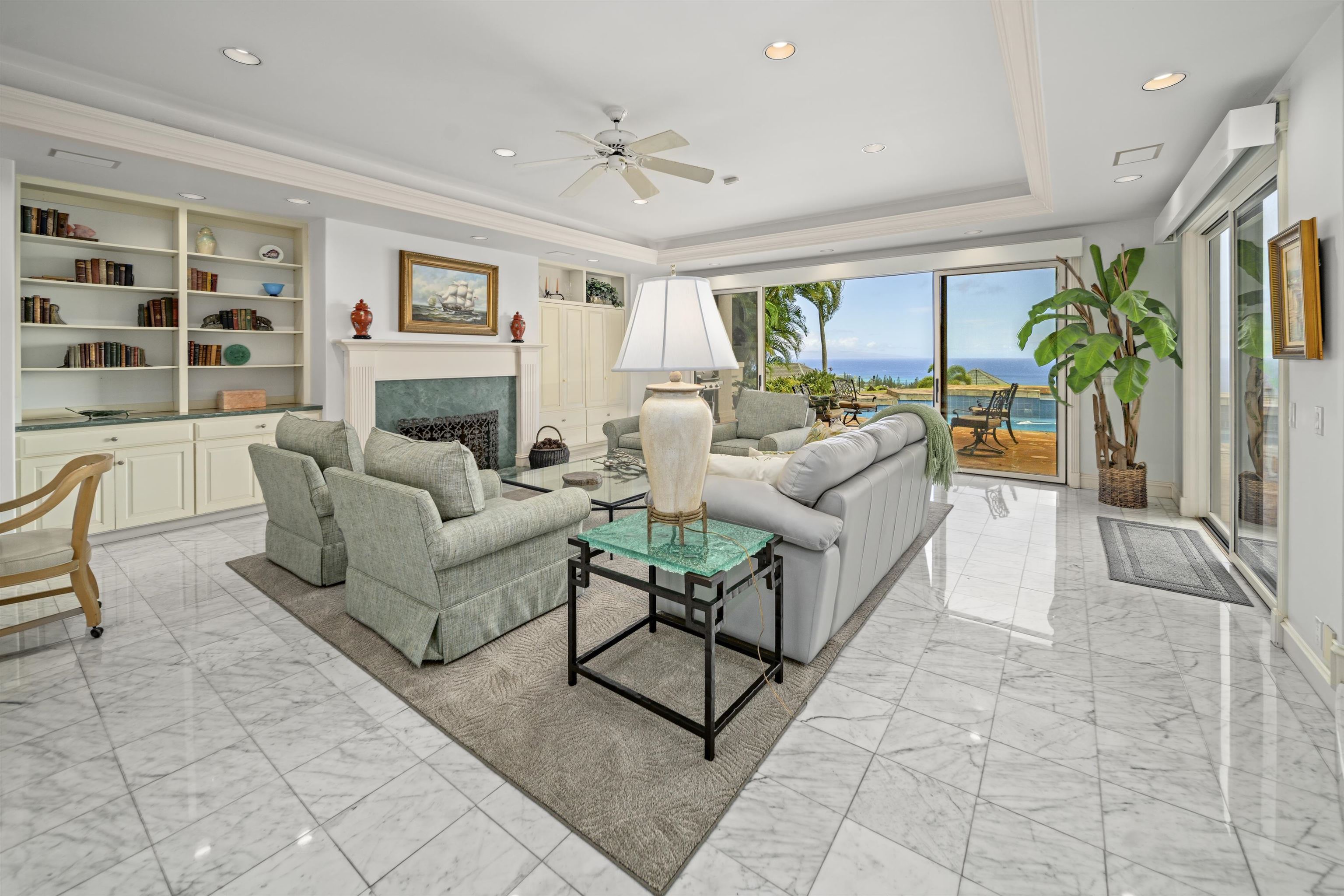 212 Crestview Road Lahaina, HI 96761 - Photo 2 of 50 a living room with furniture and a potted plant