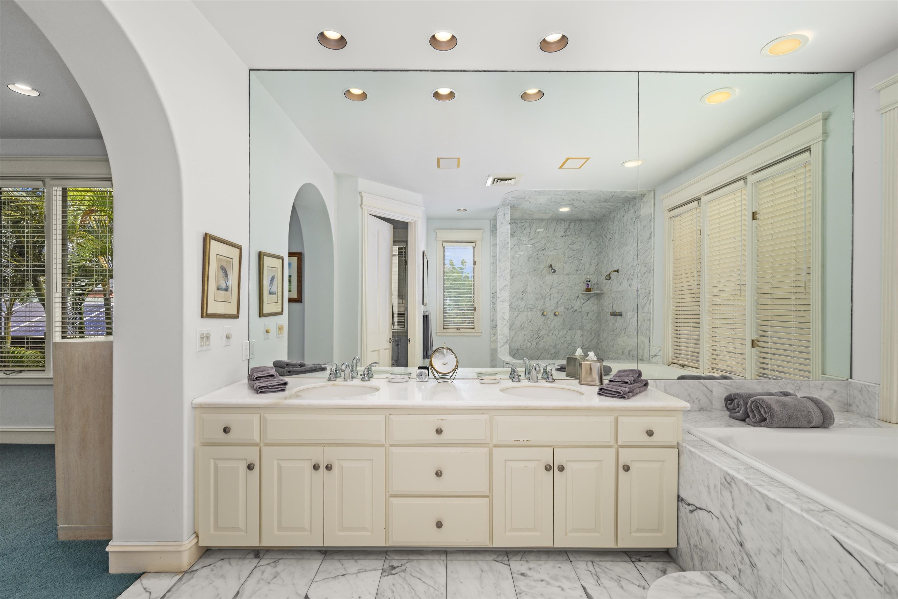 212 Crestview Road Lahaina, HI 96761 - Photo 32 of 50 a spacious bathroom with double sink and a mirror