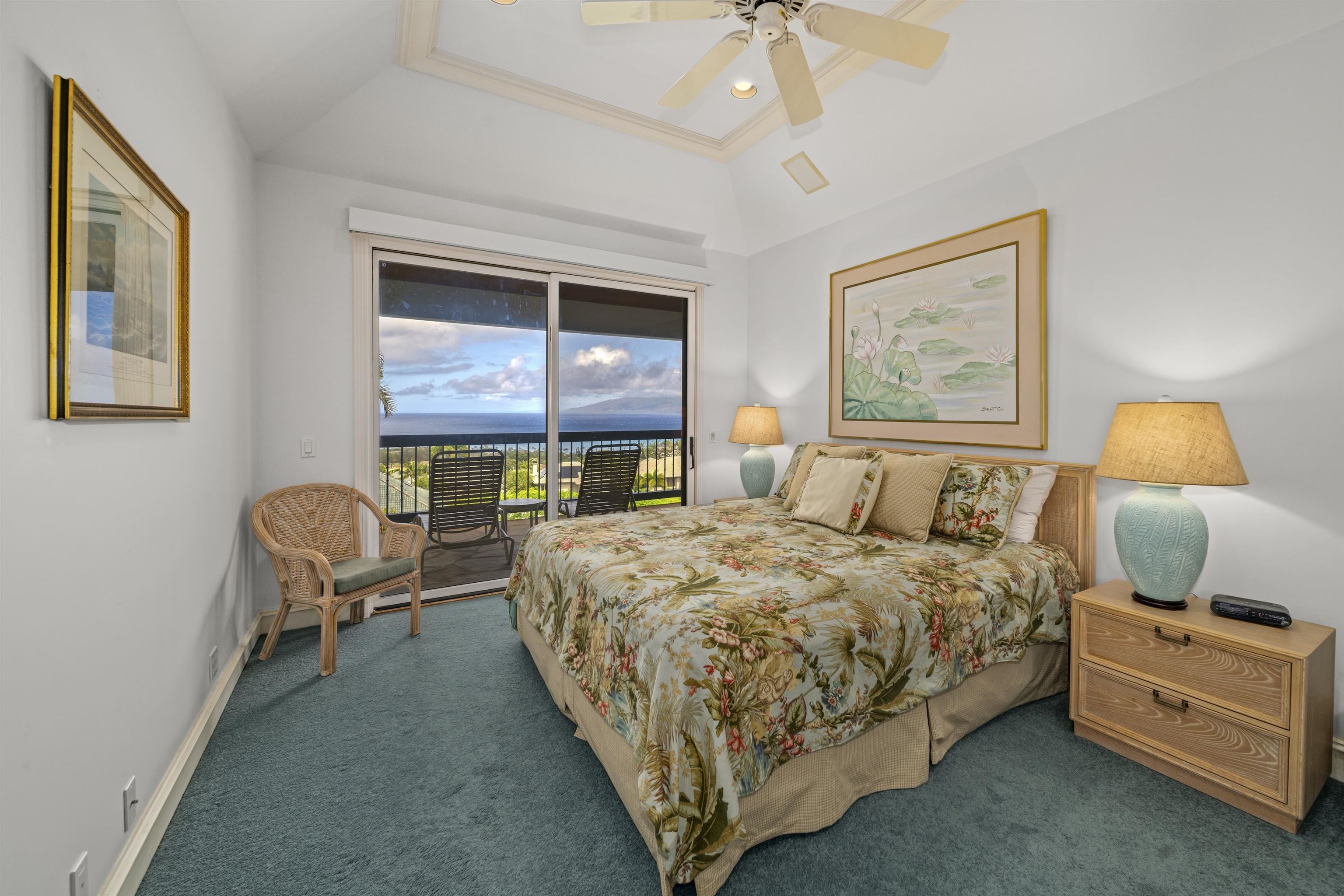 212 Crestview Road Lahaina, HI 96761 - Photo 38 of 50 a bedroom with a bed chair and wall painting