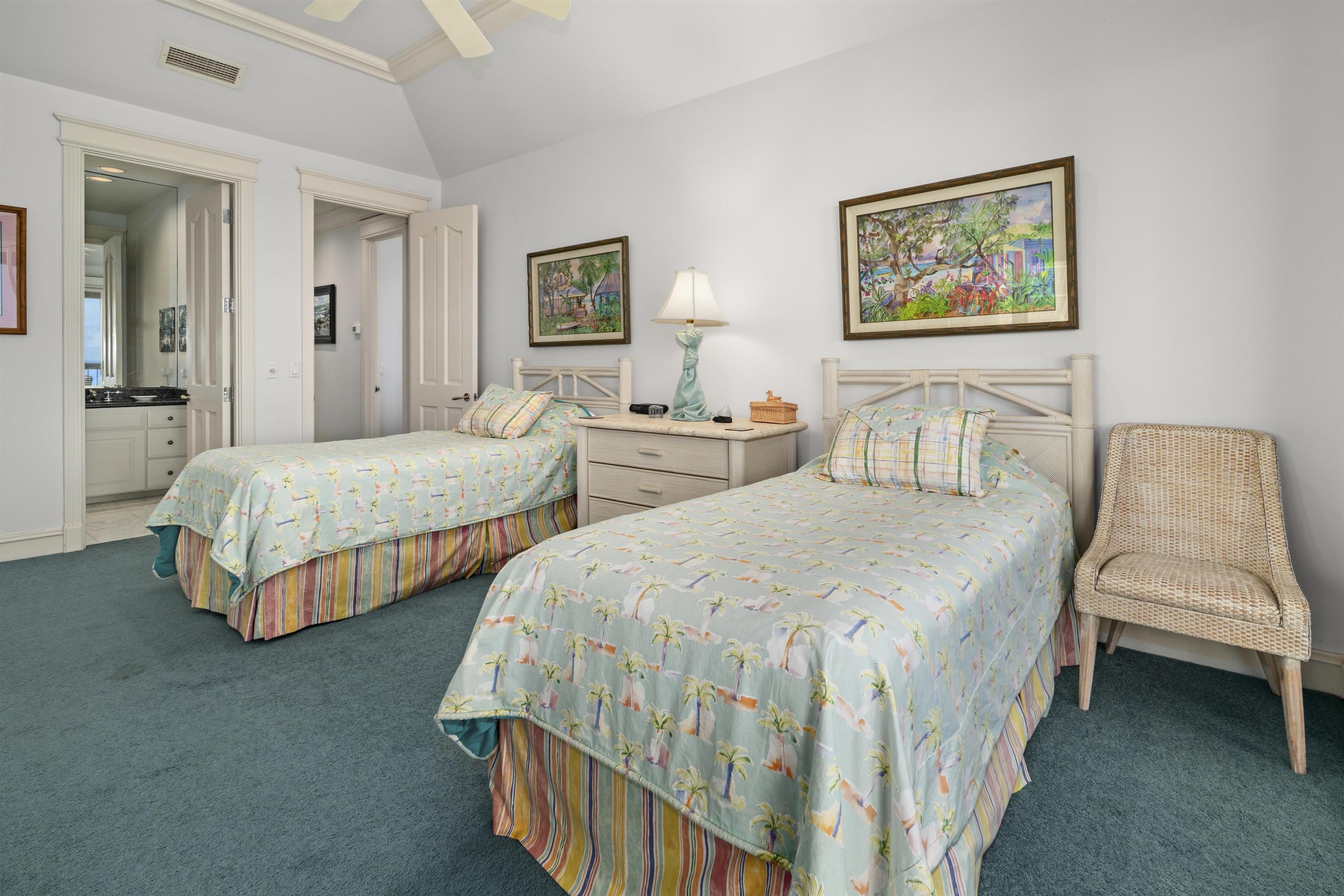 212 Crestview Road Lahaina, HI 96761 - Photo 43 of 50 a bedroom with two beds and painting on the wall