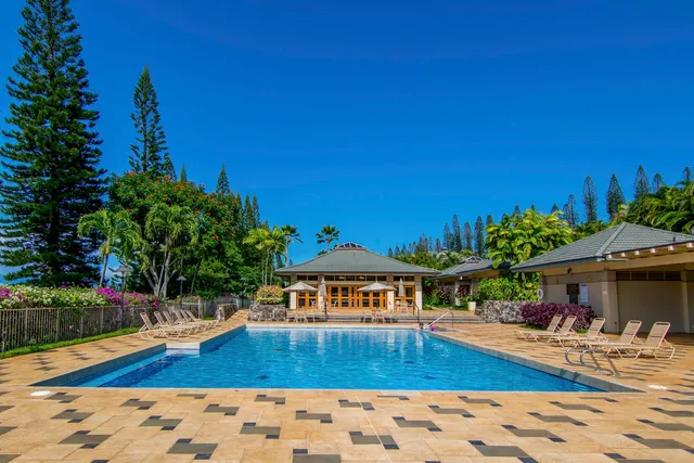 a view of a house with swimming pool
