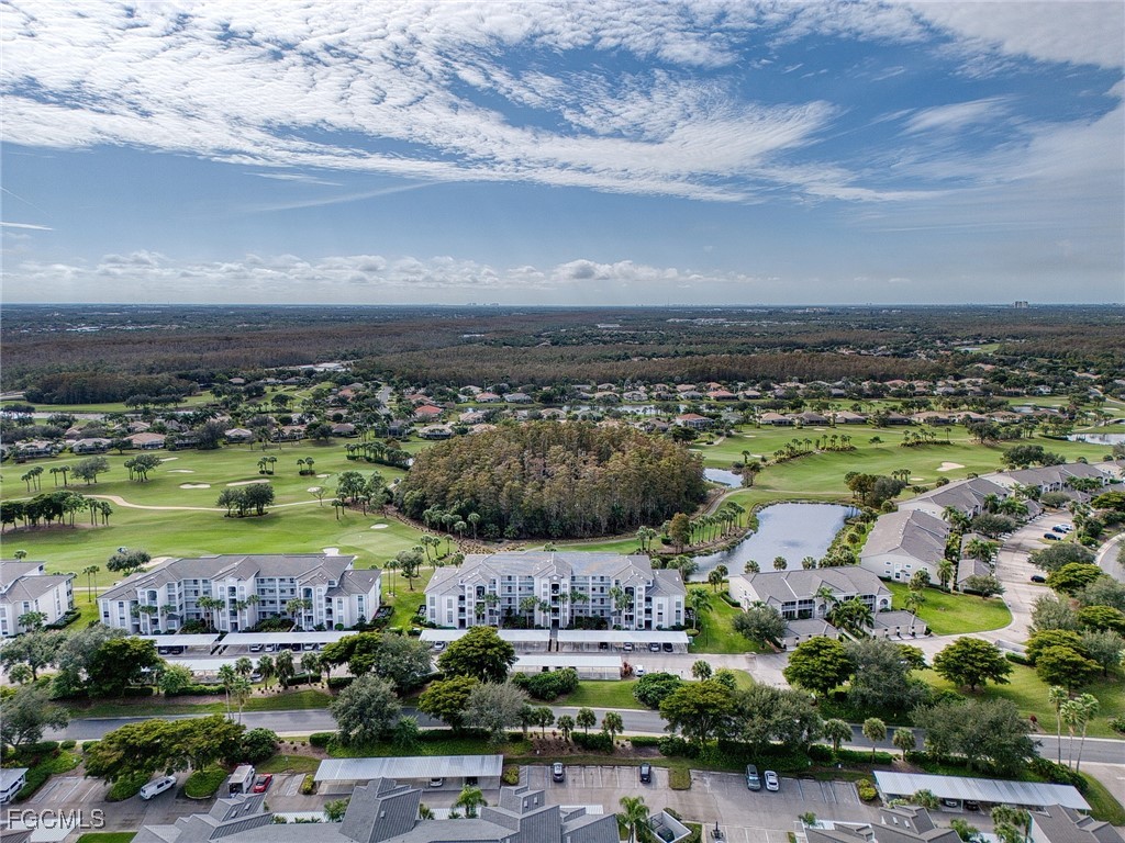 10461 Washingtonia Palm Way, Unit 3436 Fort Myers, FL 33966 - Photo 27 of 32 a view of a city with lots of residential buildings ocean and mountain view in back