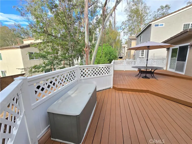 a view of a chairs and table on the wooden floor