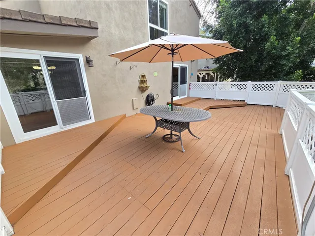 swimming pool view with a seating space