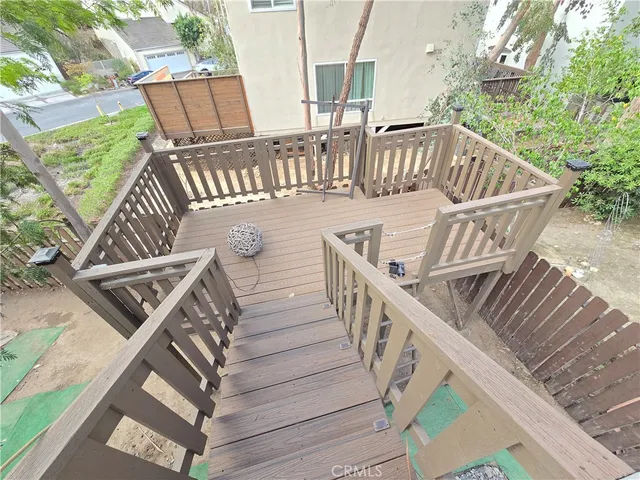 a view of balcony with furniture