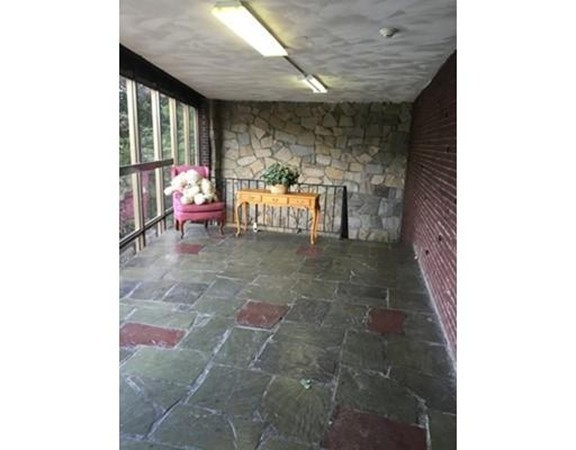 915 Edgell Road, Unit 70A Framingham, MA 01701 - Photo 3 of 11 a view of a porch with seating space