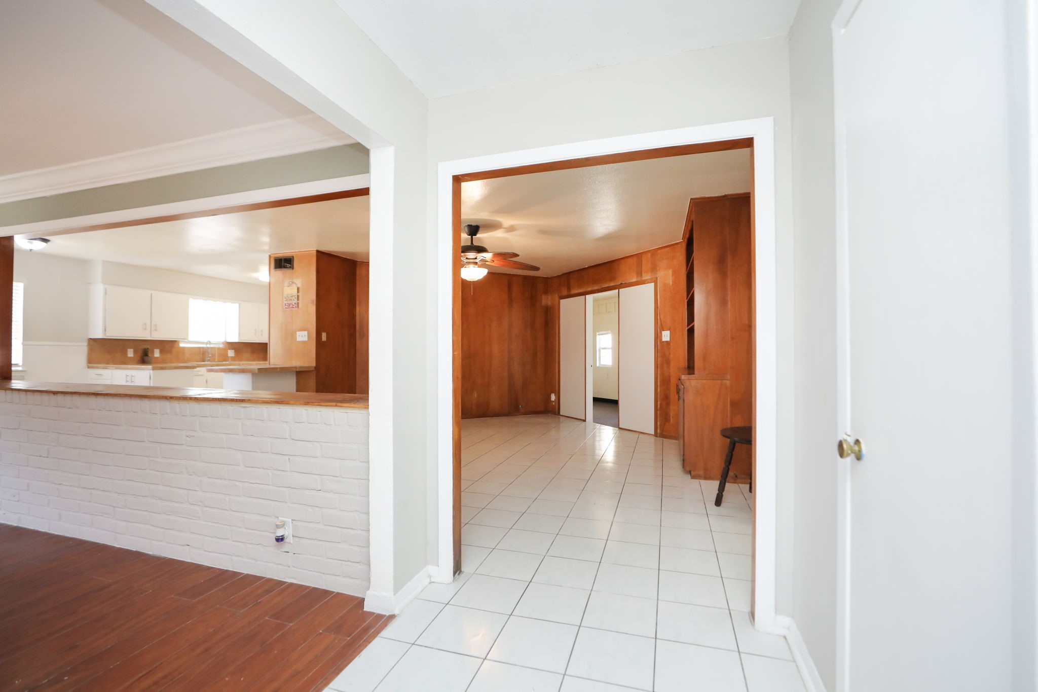 8235 Dover Street Houston, TX 77061 - Photo 4 of 36 a view of a hallway with wooden floor