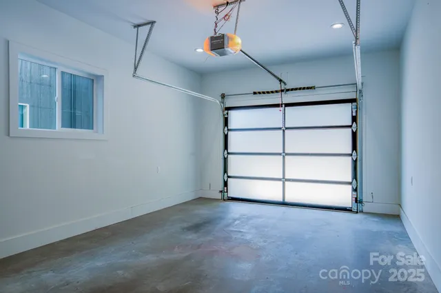 a view of a room with shelf and racks on the wall