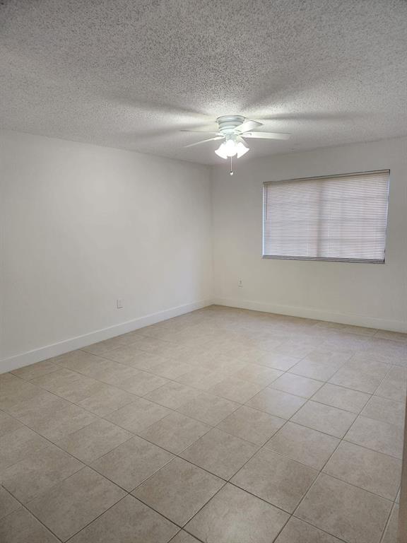 5041 Wiles Road, Unit 105 Coconut Creek, FL 33073 - Photo 2 of 7