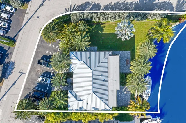 front view of a house with a garden