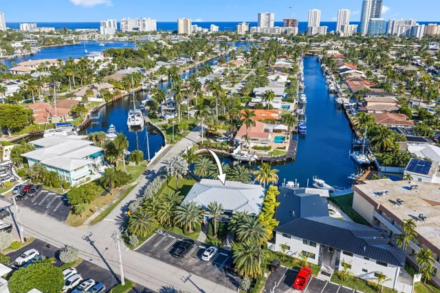 a bedroom with a bed and a ceiling fan