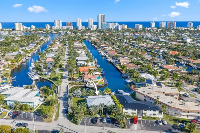 a bedroom with a bed and a ceiling fan