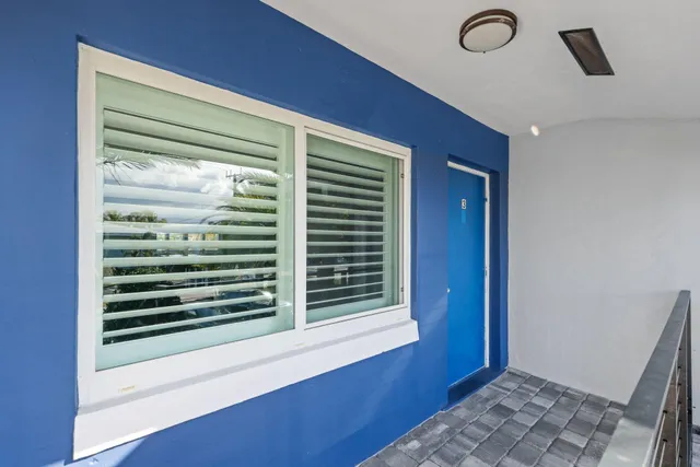 a kitchen with stainless steel appliances a refrigerator and a stove top oven