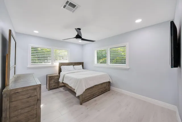 a kitchen with cabinets stainless steel appliances a sink and dishwasher
