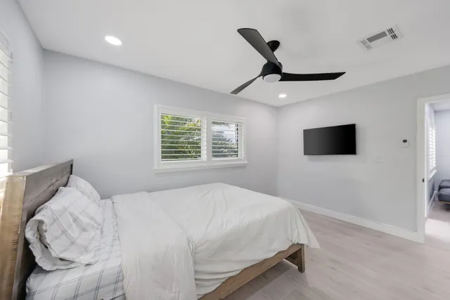 a kitchen with stainless steel appliances a stove microwave and stove top oven