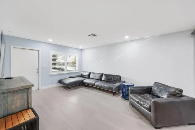 a picture of flowers in front of a window