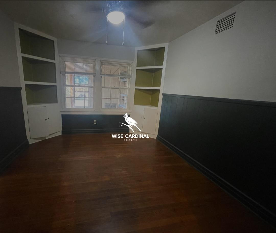 1726 25th Street Lubbock, TX 79411 - Photo 7 of 11 a view of an empty room with a window