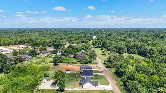 a view of swimming pool with a yard