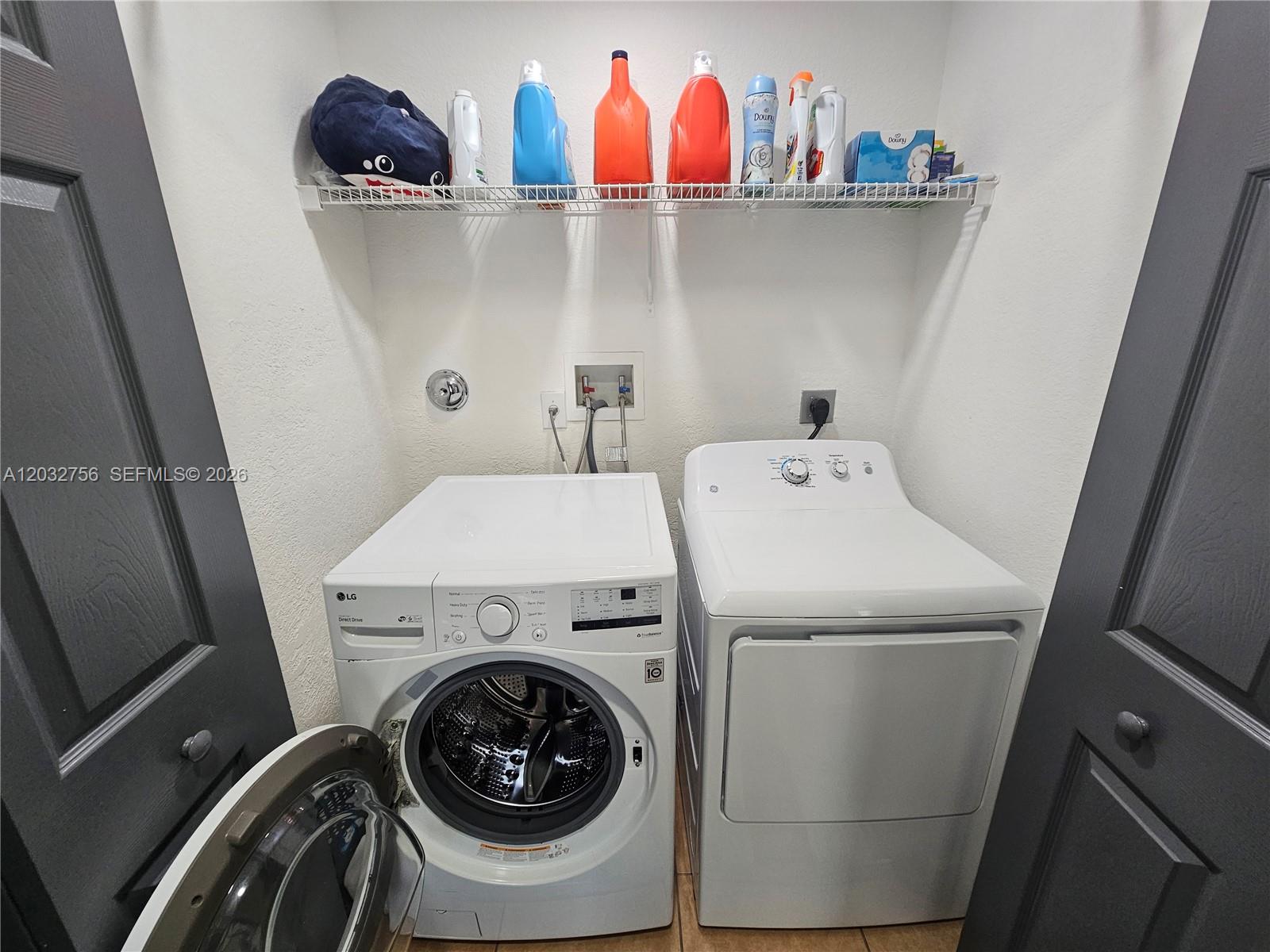 4331 Southwest 124th Way Miramar, FL 33027 - Photo 23 of 40 a utility room with dryer and washer