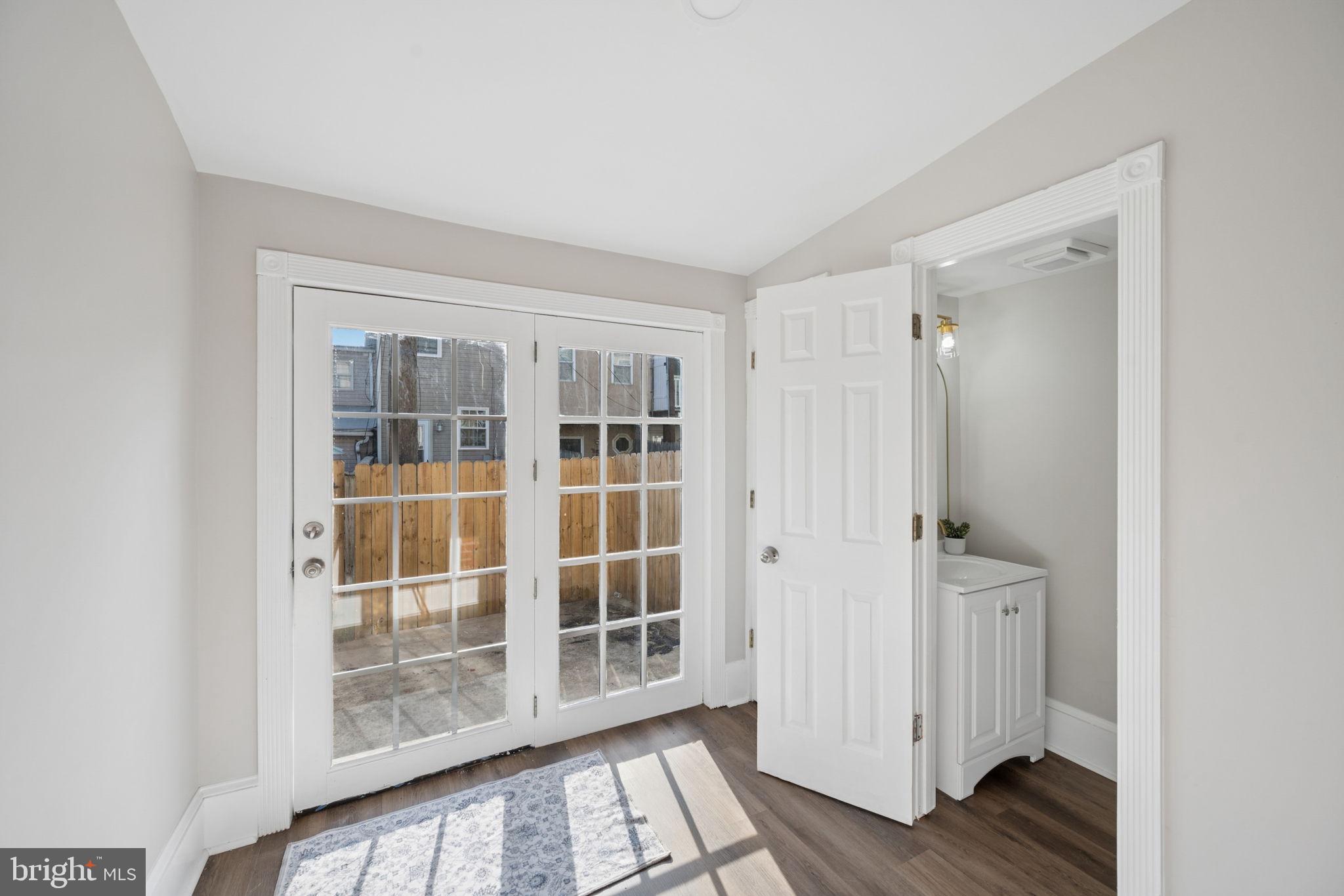 1108 South Clinton Street Baltimore, MD 21224 - Photo 16 of 66 Bright entryway with double doors.
