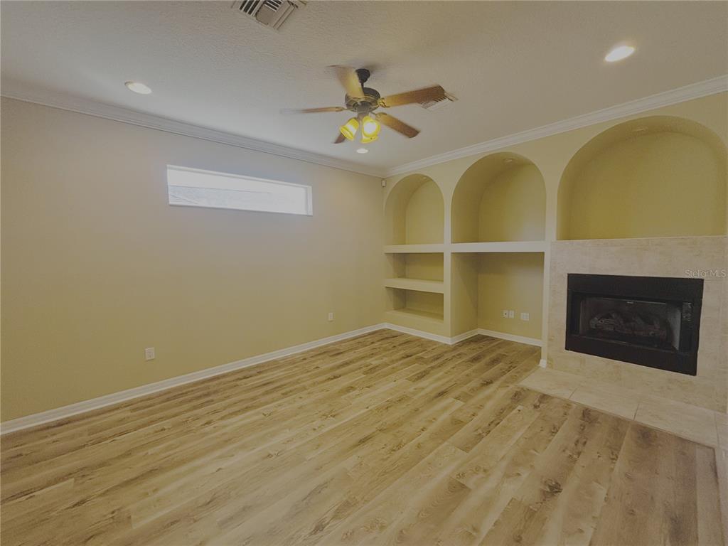 4940 Southwest 63rd Loop Ocala, FL 34474 - Photo 12 of 45 a view of an empty room with a window