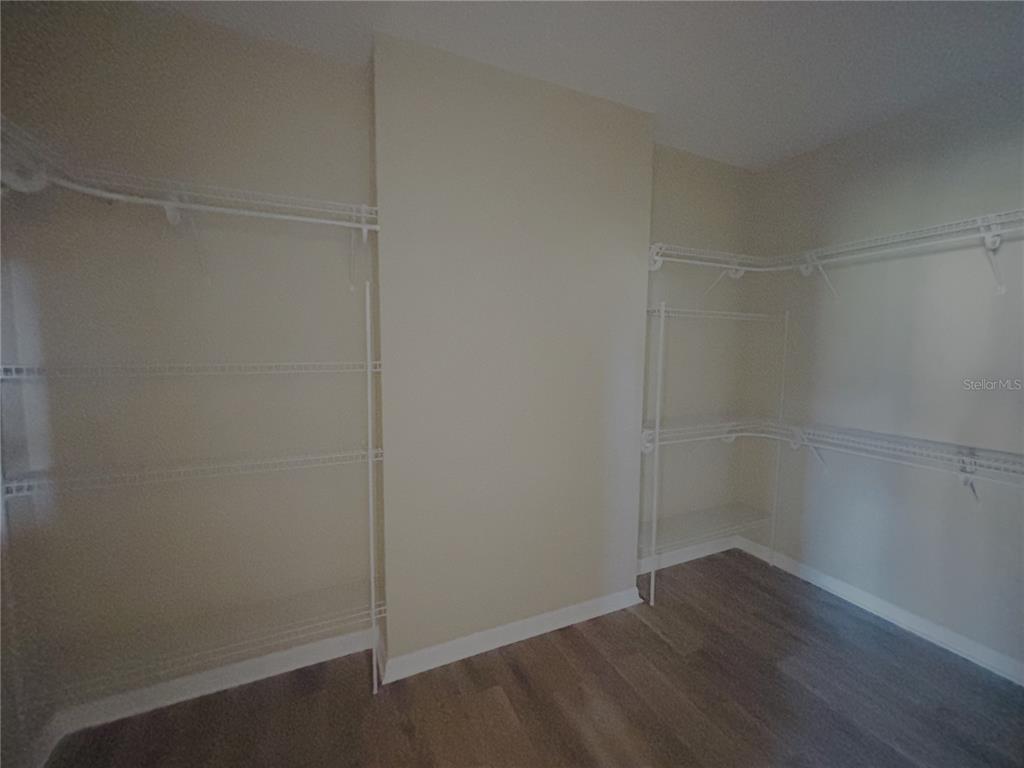 4940 Southwest 63rd Loop Ocala, FL 34474 - Photo 17 of 45 a view of a room with wooden floor