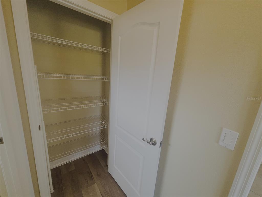 4940 Southwest 63rd Loop Ocala, FL 34474 - Photo 21 of 45 a view of walk in closet