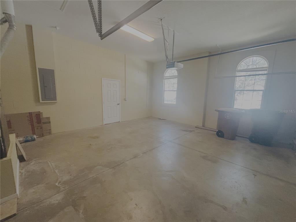 4940 Southwest 63rd Loop Ocala, FL 34474 - Photo 37 of 45 a view of an empty room with a window