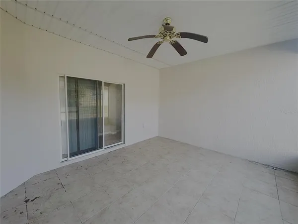 a view of room with ceiling fan