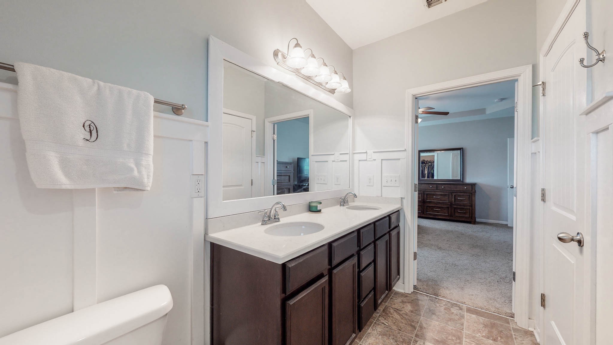 1115 Golf View Way Spring Hill, TN 37174 - Photo 23 of 49 a bathroom with a sink a toilet and a mirror