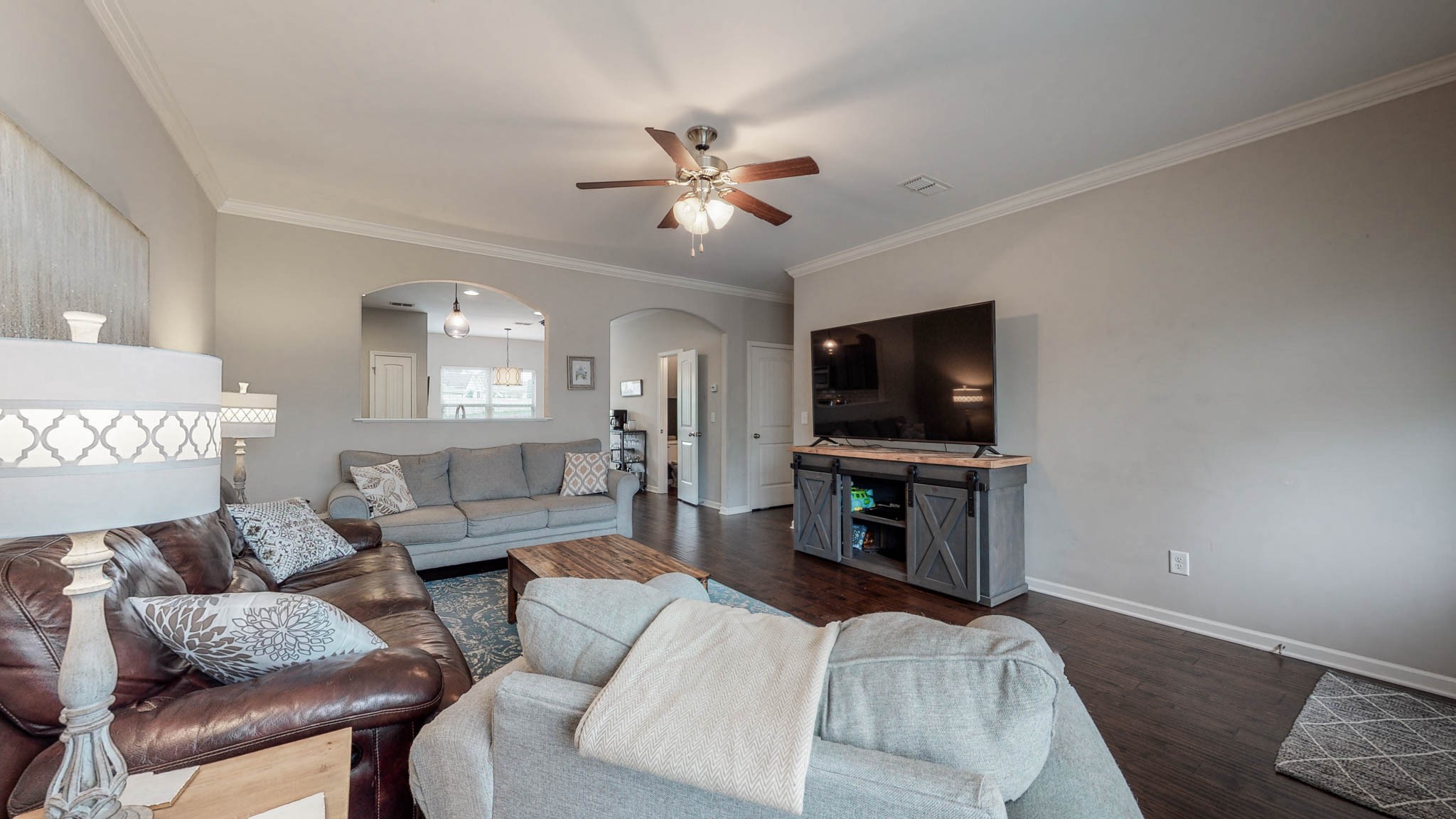 1115 Golf View Way Spring Hill, TN 37174 - Photo 4 of 49 a living room with furniture and a flat screen tv
