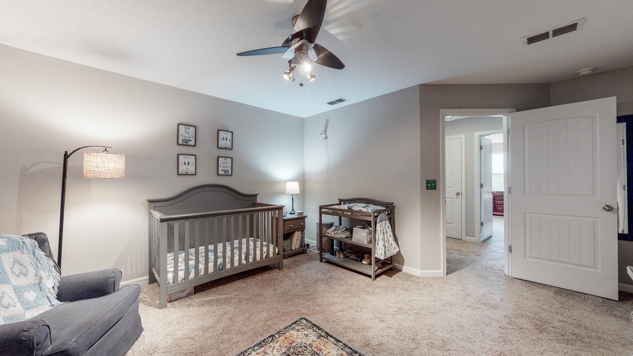 1115 Golf View Way Spring Hill, TN 37174 - Photo 36 of 49 a bedroom with furniture and a window