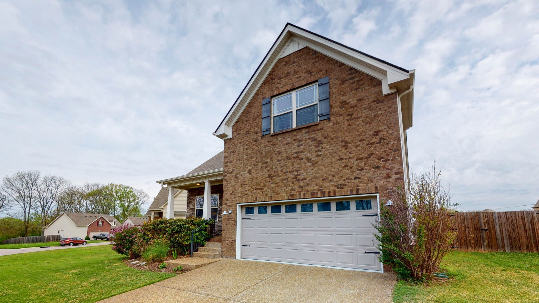 1115 Golf View Way Spring Hill, TN 37174 - Photo 38 of 49 a front view of a house with garden