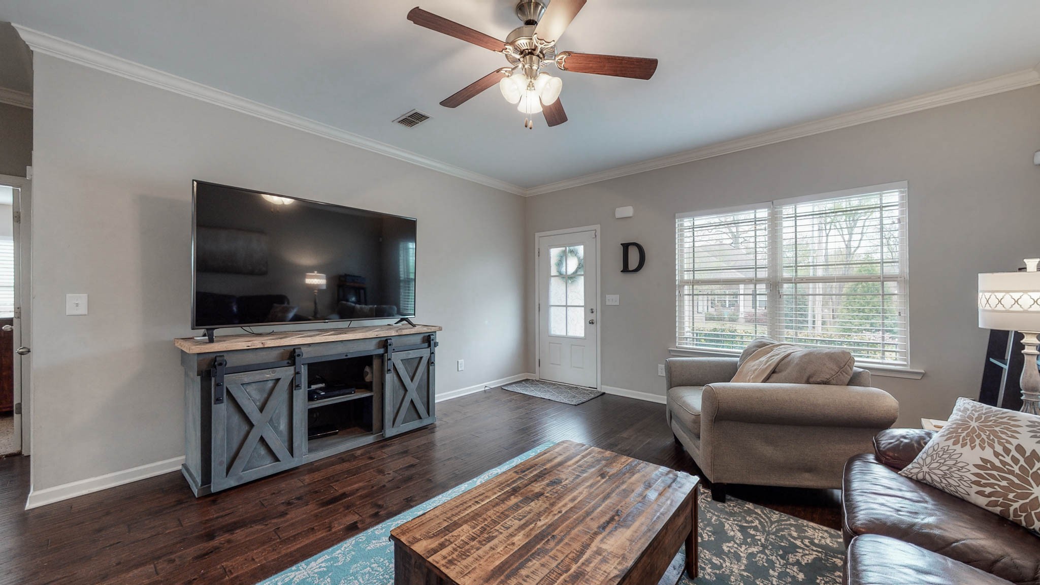 1115 Golf View Way Spring Hill, TN 37174 - Photo 5 of 49 a living room with furniture and a flat screen tv