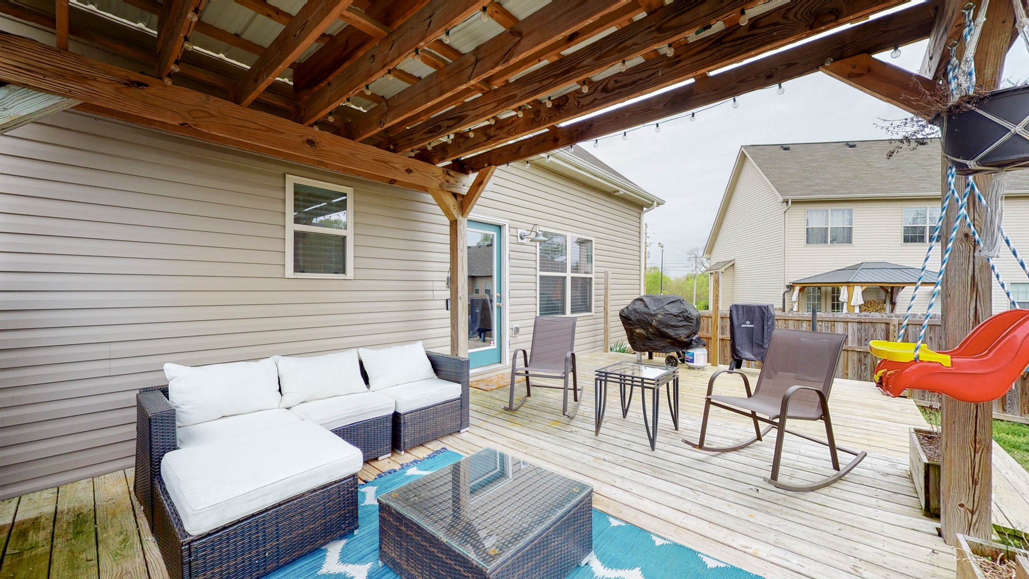 1115 Golf View Way Spring Hill, TN 37174 - Photo 47 of 49 a balcony with furniture and wooden floor