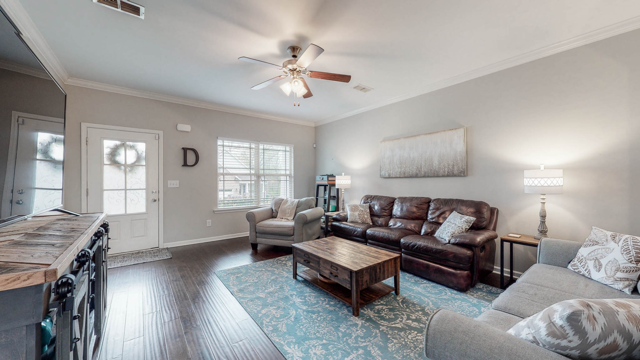 1115 Golf View Way Spring Hill, TN 37174 - Photo 6 of 49 a living room with furniture and wooden floor