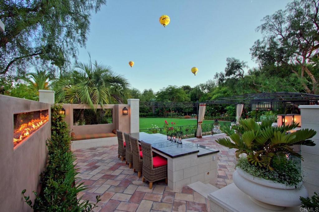 15651 Puerta Del Sol Rancho Santa Fe, CA 92067 - Photo 4 of 19 a garden view with a seating space