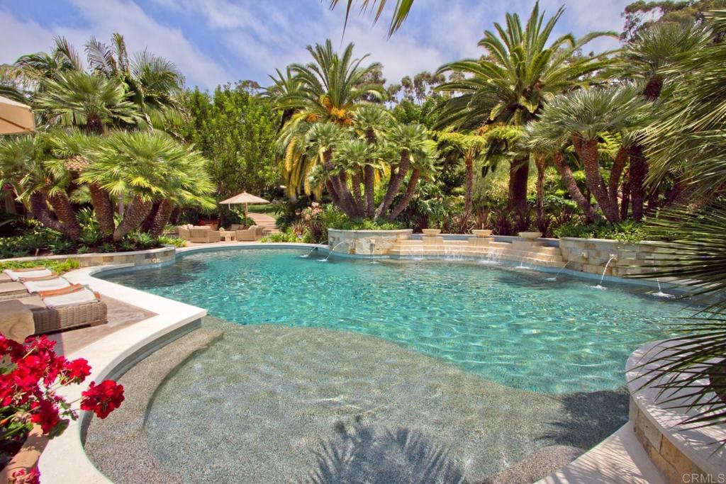 15651 Puerta Del Sol Rancho Santa Fe, CA 92067 - Photo 6 of 19 a view of a garden with plants and trees